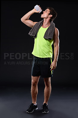 Buy stock photo Studio shot of a handsome young man in sportswear 