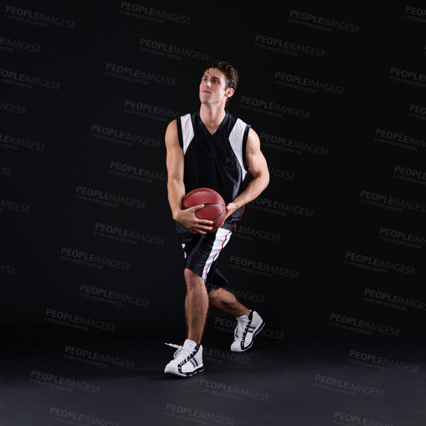 Buy stock photo Man, studio or running with basketball for fitness at night, sports or workout for health. Male athlete, black background or movement in game for exercise in gym, mockup with training for performance