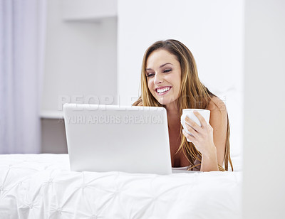 Buy stock photo Woman, bedroom and coffee on laptop for relax, search website and registration or streaming at home. Young person online on bed with computer for morning news, social media update or reading blog