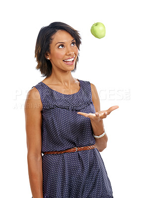 Buy stock photo Throw, health or black woman eating an apple or fruits in studio on white background with marketing space. Smile, organic or happy African girl advertising healthy food diet for self care or wellness