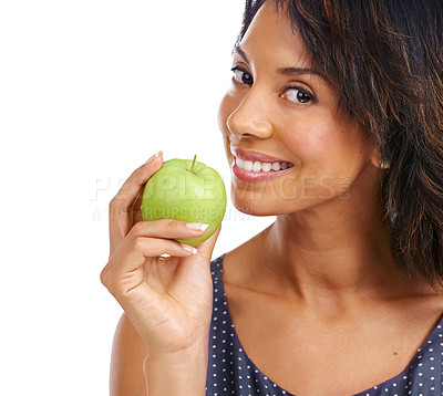 Buy stock photo Black woman, studio portrait and apple with smile, nutrition or diet for healthy cholesterol, vitamin c or eating by backdrop. Woman, happy or green fruit for health, energy or wellness by background