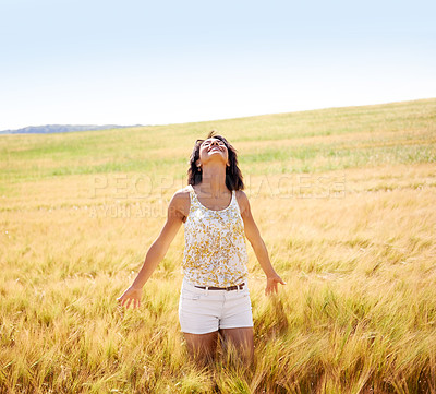 Buy stock photo Breathing, freedom or happy woman in a field in the countryside in spring to relax on break. Smile, wellness or female person in farm for fresh air on holiday vacation, gratitude or travel in nature