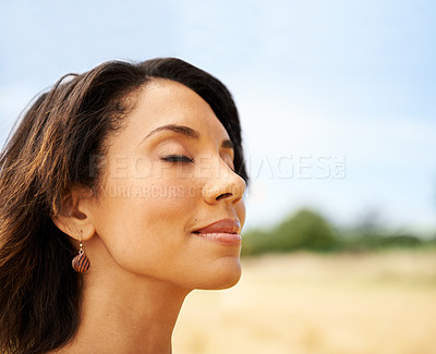 Buy stock photo Relax, freedom or calm woman in a field in the countryside or outdoor garden in spring, park or nature. Zen, wellness or female person in farm to breathe in fresh air on holiday vacation or travel