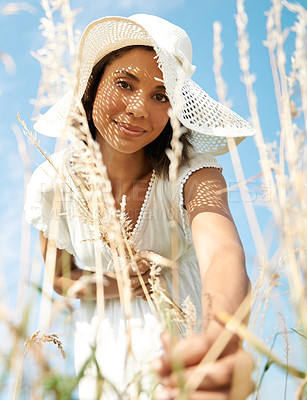Buy stock photo Portrait, pick wheat or woman in field, nature or outdoors for plant growth or peace in summer. Smile, grass or low angle of female farmer in farm for fresh air, farming or gardening in countryside
