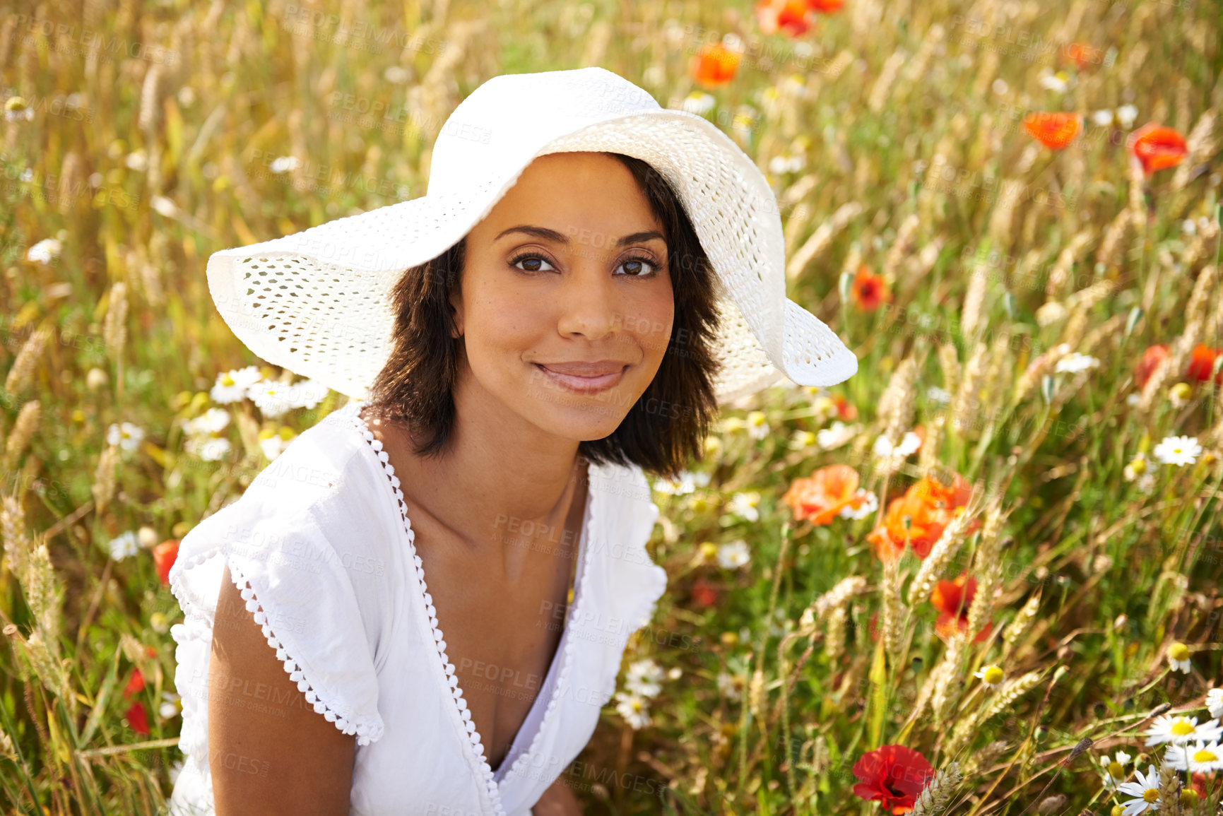 Buy stock photo Portrait, flowers or woman in an outdoor field, countryside or nature in summer to relax on break. Hat, wellness or female person in garden or farm for fresh air on holiday vacation travel or freedom