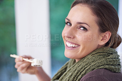 Buy stock photo Woman, sushi and happy in home, portrait or eating with chopsticks for wellness, diet or health. Person, fish and smile for lunch, nutrition or snack with takeaway food in house, apartment and hungry