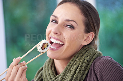 Buy stock photo Happy woman, eating sushi and healthy food in portrait, lunch or dinner, Japanese cuisine and seafood with chopsticks. Catering, hungry and diet, relax with meal at home and dish for nutrition