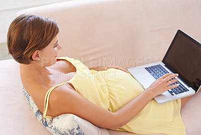 Buy stock photo Screen, pregnant or woman on laptop in house living room for childcare website, information or birth learning. Above, mockup space or relax person on home sofa technology, research or pregnancy blog