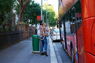 Buy stock photo Bus stop, travel and man with a bicycle, city and commute with transportation and adventure. Person, outdoor and guy with a bike or cyclist in a road, summer or Cape Town with weekend break or street