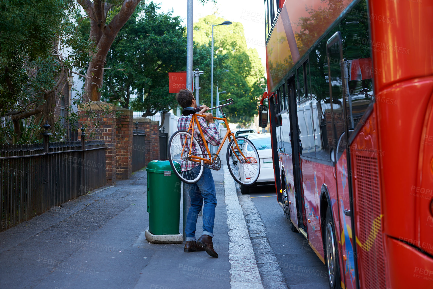 Buy stock photo Bus stop, travel and man with a bicycle, city and commute with transportation and adventure. Person, outdoor and guy with a bike or cyclist in a road, summer or Cape Town with weekend break or street