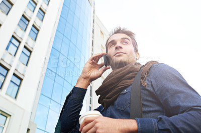 Buy stock photo Man, smartphone and smile in city for phone call, conversation or networking in Los Angeles. Male person, technology and confidence with communication, contact and happy in morning from low angle
