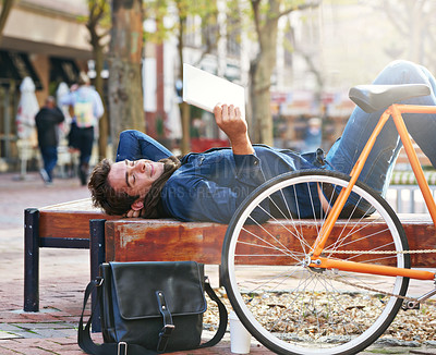 Buy stock photo Relax, city and happy with man, tablet and bicycle with connection and online reading with internet and social media. Person, outdoor and New York with guy and technology with ebook and website info