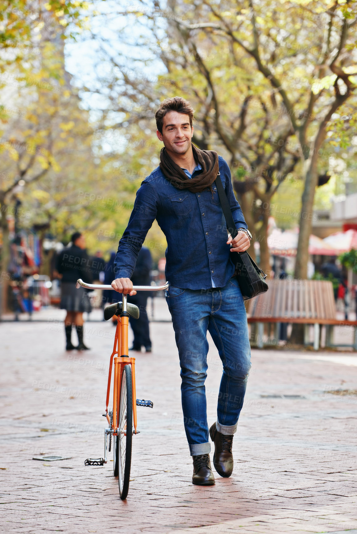 Buy stock photo Man, walk and push bike in city to travel on eco friendly transport outdoor, commute or trip. Cycling, happy person or bicycle in urban town, street or road for journey at sidewalk of park with bag
