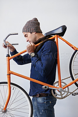 Buy stock photo Man, studio and bike for sustainability, transportation or exercise on white background. Hipster cyclist, carbon neutral and eco friendly travel for environmental commute or fitness and trip