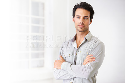 Buy stock photo Portrait, man and real estate agent with arms crossed, pride for career or job with mockup. Face, serious and male realtor, entrepreneur and confident professional from Spain standing in home.