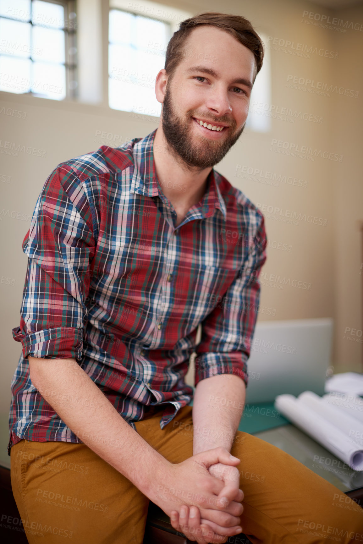 Buy stock photo Portrait, laptop and smile in workplace, architecture and career in construction industry on break. Man, contractor and entrepreneur of startup, small business and blueprint with floor plan on desk