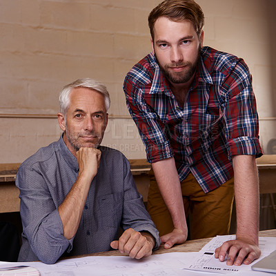 Buy stock photo Architecture, teamwork and portrait of men in workshop with blueprint for building construction. Senior engineer, serious father and son working on design, project and plan of apprentice and mentor.