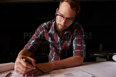 Buy stock photo Man, architect and table or paper, thinking and working on planning for construction. Architecture, building or engineering for infrastructure, design and contractor or career for remodel for measure