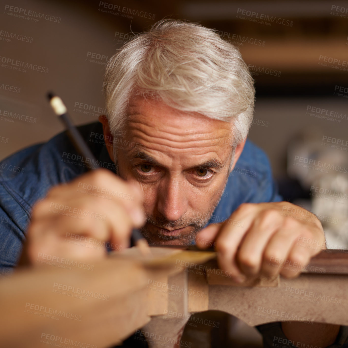 Buy stock photo Focus, measurement and carpenter with pencil, furniture and designer table manufacturing workshop. Creativity, small business and professional carpentry, man working on sustainable diy wood project.