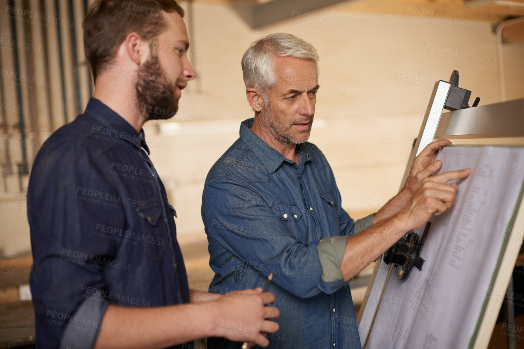 Buy stock photo Carpenter, team and men with blueprint for construction, planning project and creative. Architecture, apprentice and mentor with design, drawing and senior father with son for training at workshop