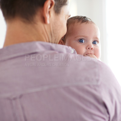 Buy stock photo Family, baby and face with dad in home with love, support and care together with parent and bonding. Relax, father and happy in a house with hug of calm infant with childcare and thinking with youth