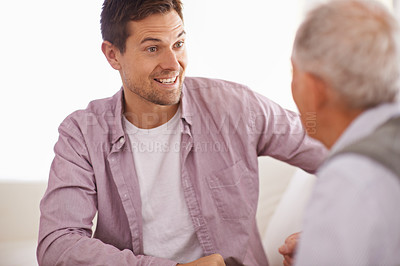 Buy stock photo Father, adult son and conversation for bonding and communication, respect and love with trust in healthy relationship. Happiness, support and men with advice or help in life, chat or story at home