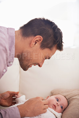 Buy stock photo Family, baby and dad on sofa with love, support and care together with parent and bonding. Relax, father and happy in a house with development of a calm infant with childcare and smile and growth