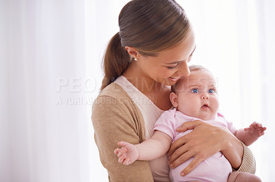 Buy stock photo Mother, hug and baby with love, support and care for family, bonding and maternity at home. Happy mom, parent or woman playing with her newborn child or infant for development, excited and growth