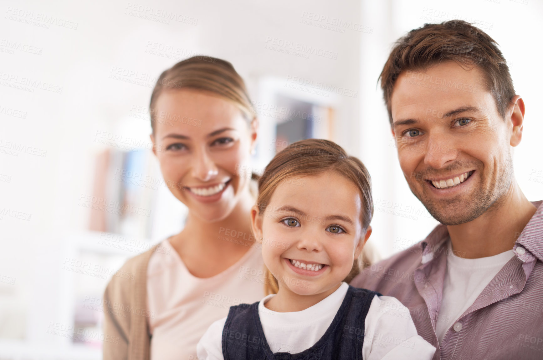 Buy stock photo Portrait, family and happy child with parents in house for bonding, love and relax together. Face, mother and father with kid in living room for relationship and care of girl for connection in home