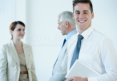 Buy stock photo Businessman, portrait and confidence in office, company pride and smiling with tablet for leadership. Business people, communication and discussion in workplace, support and teamwork on technology