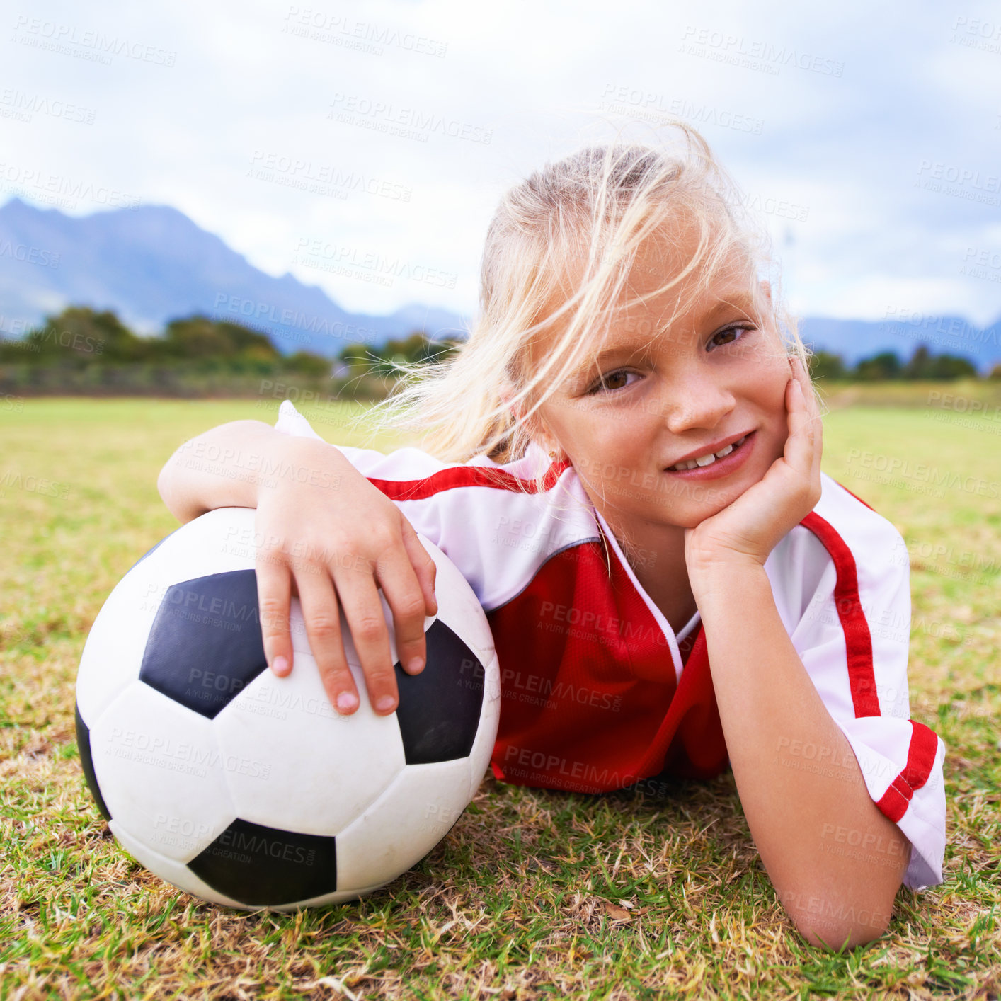 Buy stock photo Girl, soccer player and ball with portrait, smile and ready for game, field and child. Outdoor, playful and sport for childhood, happy and athlete for match, alone and outside on football pitch