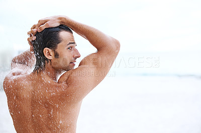Buy stock photo Shower, beach and man with water for washing, cleaning hair and grooming for healthy skin. Back mockup, treatment and person with splash for natural hygiene, wellness and skincare hydration