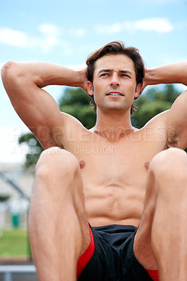 Buy stock photo Man, shirtless and sit ups for fitness, exercise and workout outdoors, muscle and crunches or cardio for health. Male person, body building and athlete in training, strong and commitment for wellness