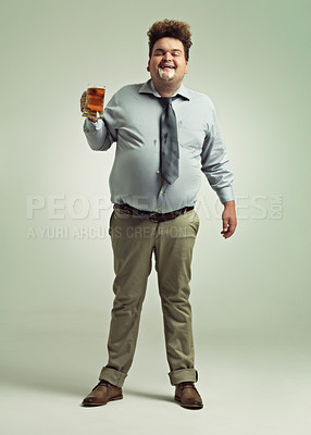 Buy stock photo Man, portrait and drinking with beer foam in party or obesity on a studio background. Young male person or plus size model with glass, mug or alcohol in satisfaction for wine or booze on mockup space