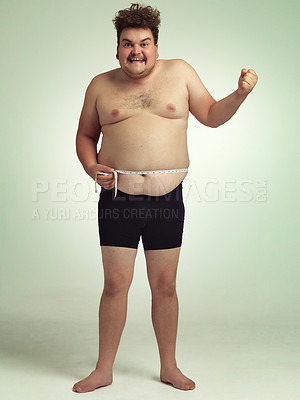 Buy stock photo Shot of an plus size man measuring himself