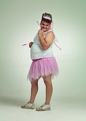 Buy stock photo An overweight man comically dressed-up in a pink fairy costume
