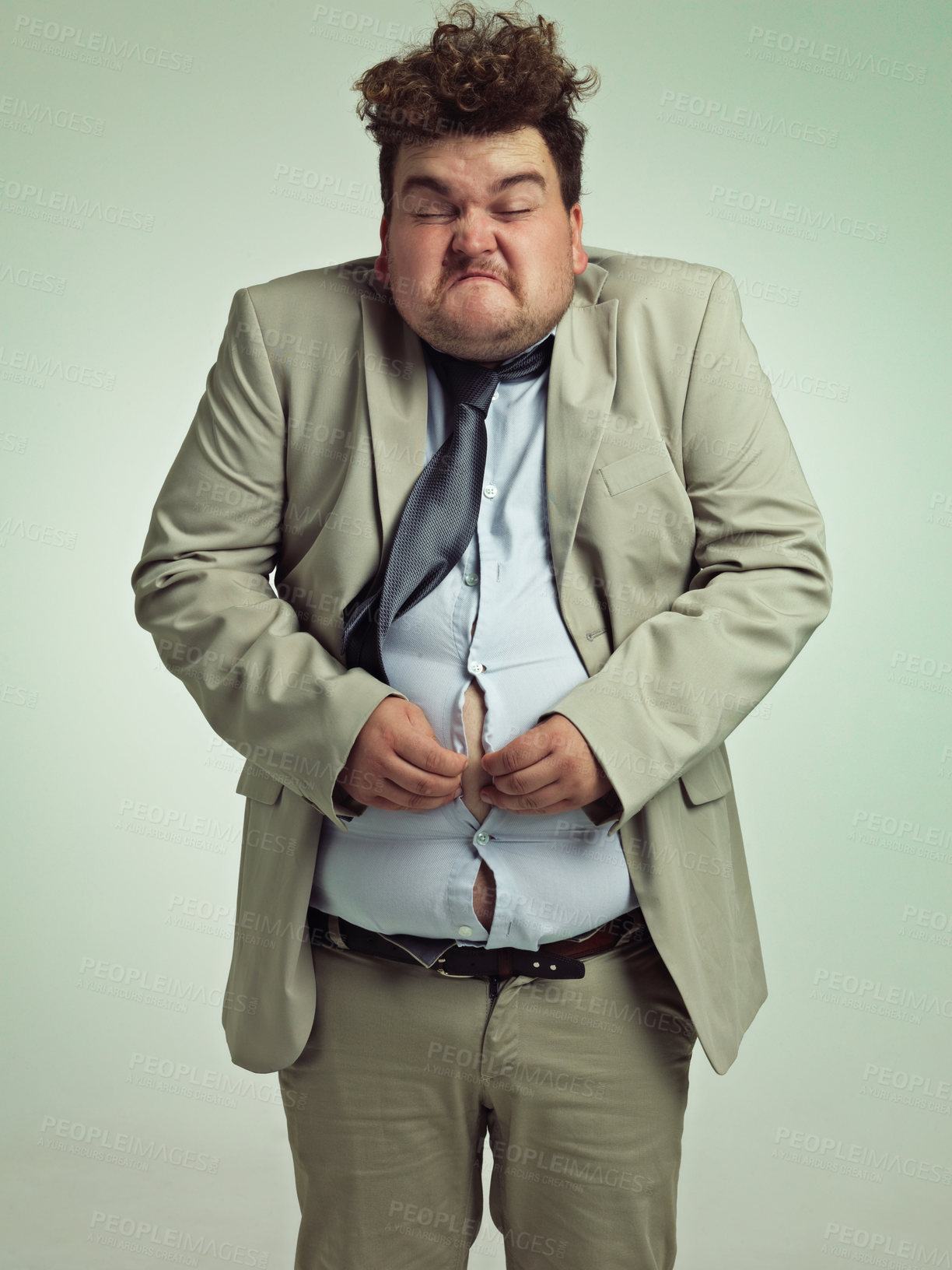 Buy stock photo Overweight, portrait and man fitting in shirt, studio and employee with stomach for clothes. Plus size, male person and guy with obesity unhappy with fat of belly in suit for professional job