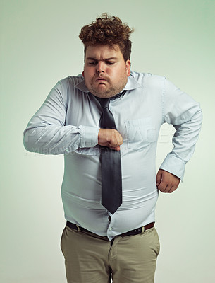 Buy stock photo Sick, employee and man with vomit, unhealthy and professional in suit with fist on chest. Adult, male person and guy with risk of collapse, pain and cardiac arrest of entrepreneur in studio