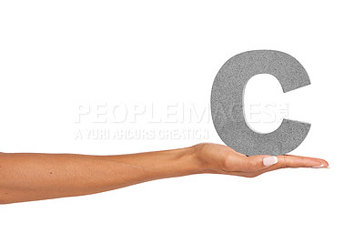 Buy stock photo A young woman holding a capital letter 