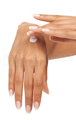 Buy stock photo Hands, woman and skincare cream for manicure, beauty and aesthetic cosmetics in studio on white background. Closeup, dermatology and apply lotion, moisturizer and soft treatment of nails on fingers 