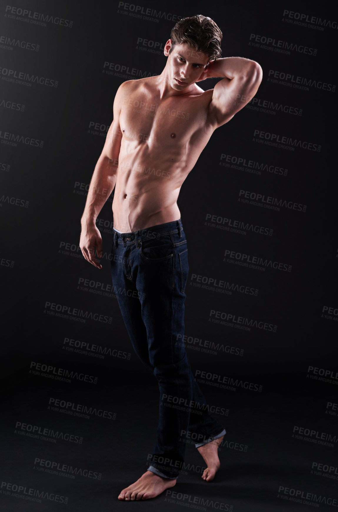 Buy stock photo Jeans, athlete and portrait of man in studio for fitness, muscle and pride in healthy body. Bodybuilder, male person and serious with confidence on black background for sports, wellness and shirtless