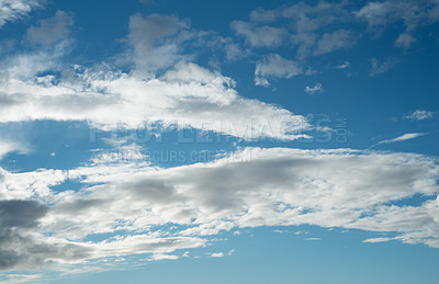 Buy stock photo Nature, sunshine and clouds in blue sky with warm climate, texture and meteorology on horizon. Heaven, spiritual air and summer weather with environment, cloudscape and natural skyline in morning