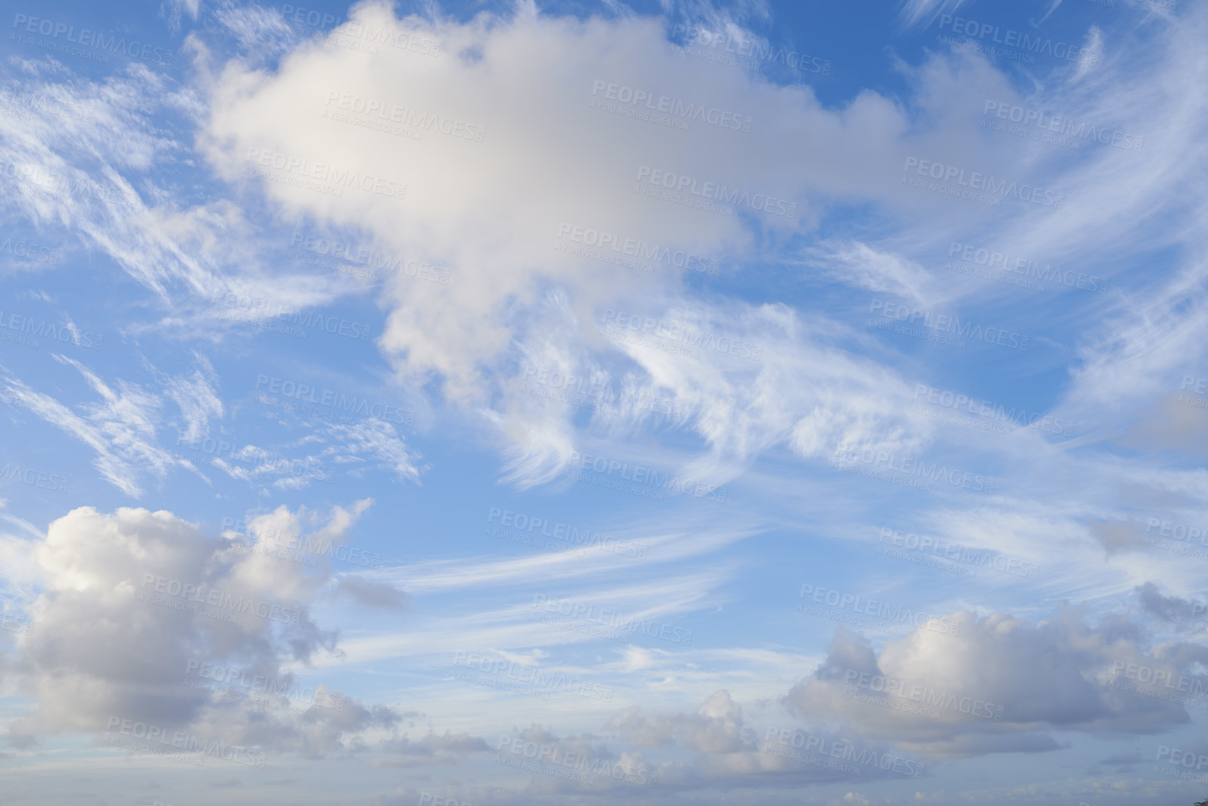 Buy stock photo Bright clouds, blue sky on a beautiful summer afternoon. Cloudscape and the sun shining on an overcast day with copy space. A vibrant horizon with sunlight with white cumulus clouds