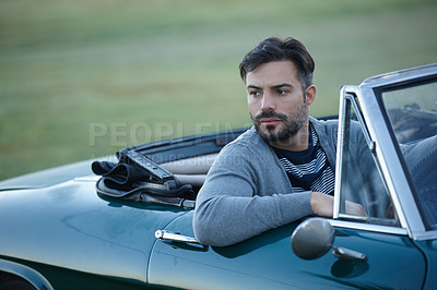 Buy stock photo Shot of a young man on a roadtrip