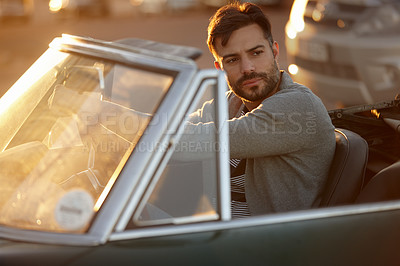 Buy stock photo Shot of a young man on a roadtrip