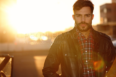 Buy stock photo Cropped shot of a handsome young man outdoors