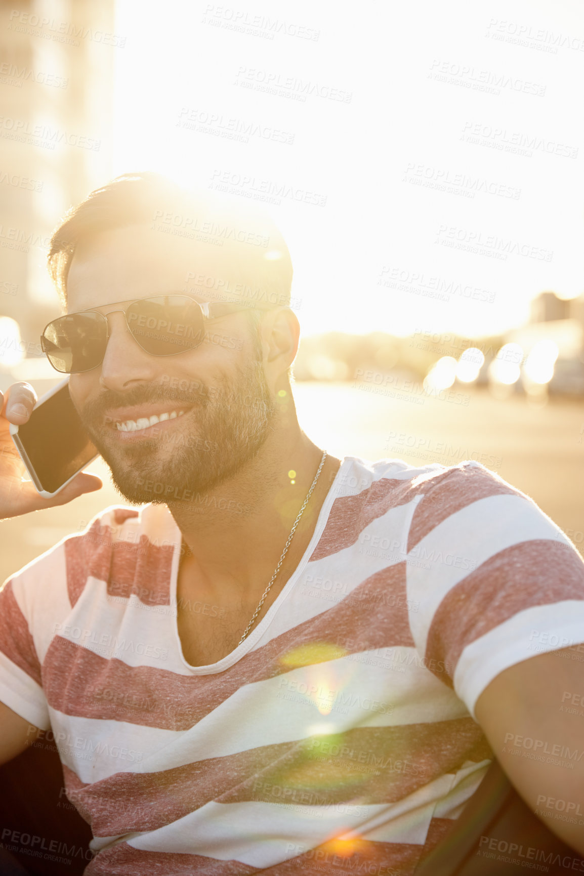 Buy stock photo Man, phone call and sunglasses in city, conversation and sun flare for vacation in Miami. Weekend trip, shades and online for communication in downtown, booking tour and tourist travel on holiday