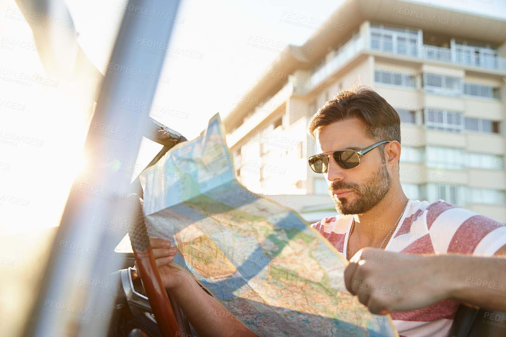 Buy stock photo Map, vehicle and man on road trip for vacation, getaway or holiday with luxury transportation. Outdoor, adventure and male person driving car for navigation on weekend journey or travel destination.