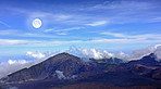 The Moon over volcano mountains - Maui, Hawaii