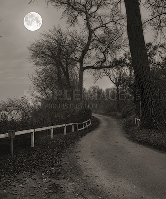 Buy stock photo A photo of the moon over a small countryside road